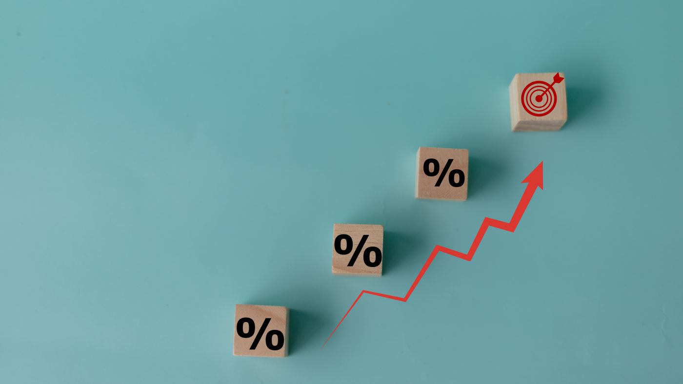 Concept Of Increasing Sales. Wooden Cubes With Percentage Icon A - Auster Inteligência Contábil