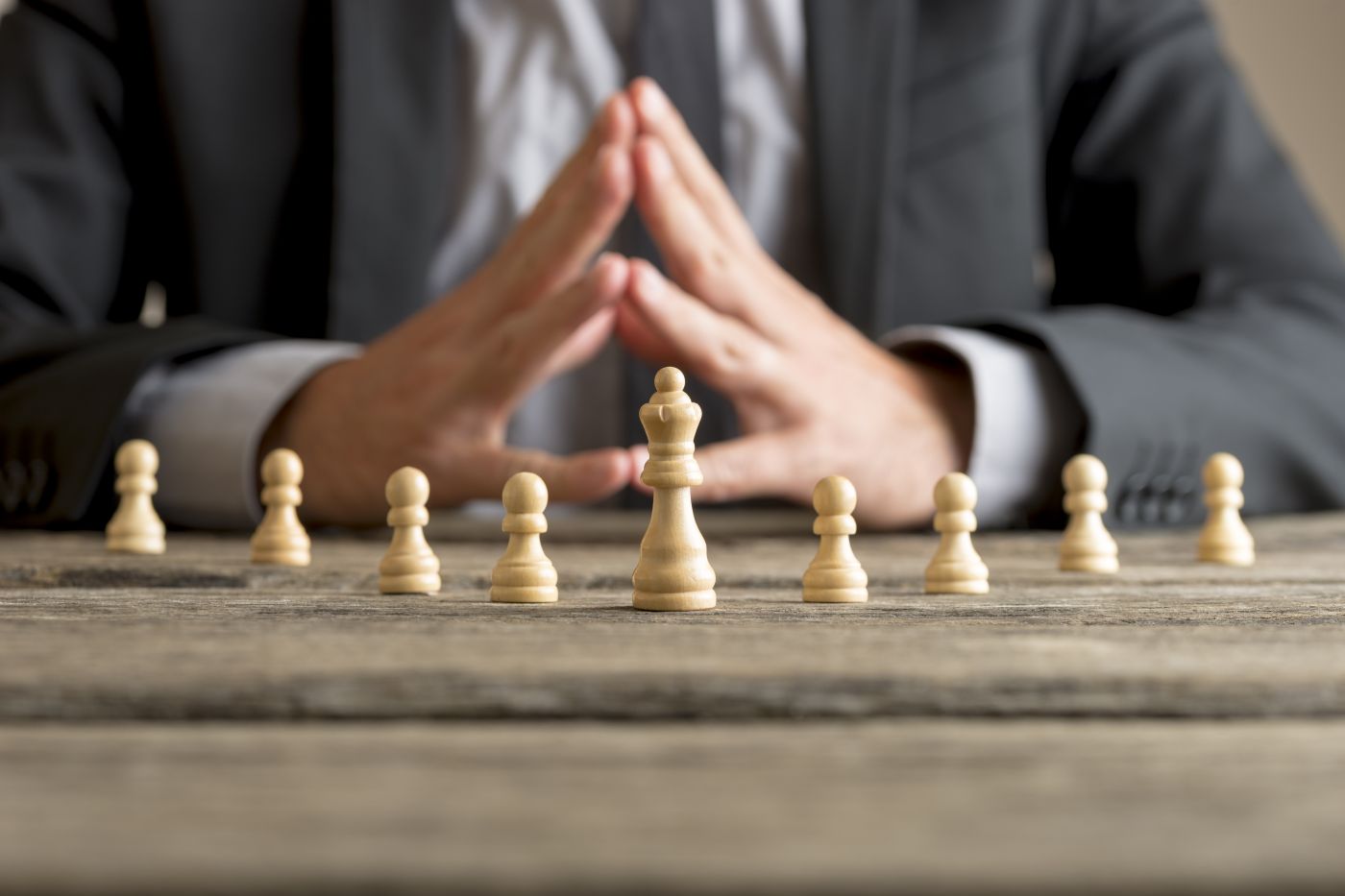 Businessman With Clasped Hands Planning Strategy - Auster Inteligência Contábil
