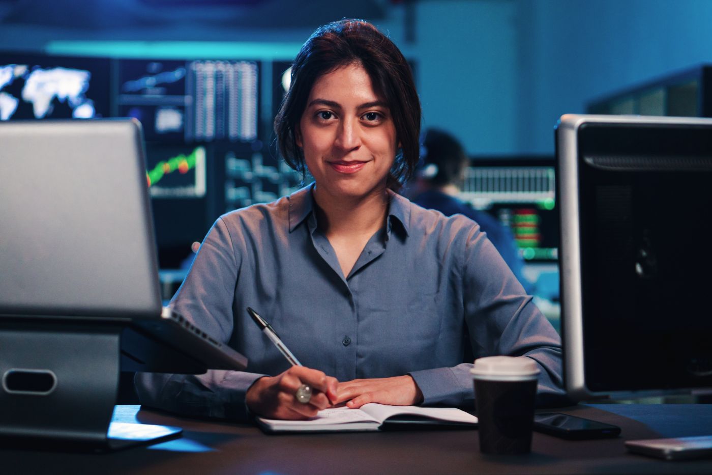 Portrait Of Young Adult Successful Business Woman, Secretary, Sales Manager, Consultant, In Formal Shirt, Sitting At Office Workplace With Laptop, Looking At Camera, Smiling - Auster Inteligência Contábil