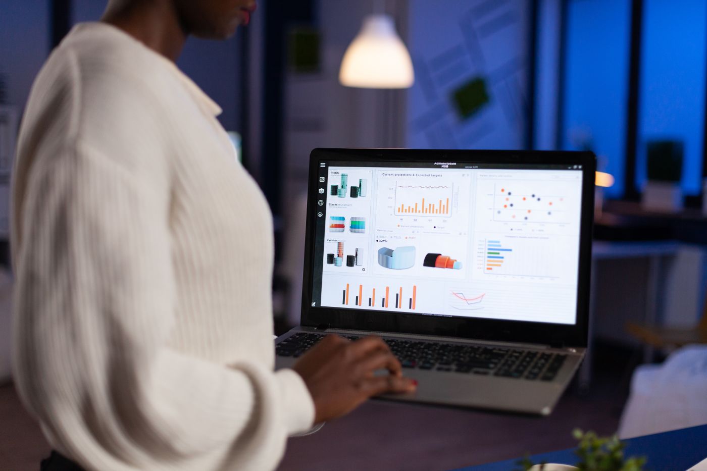 African American Businesswoman Holding Laptop Computer Typing Economic Company Profit - Auster Inteligência Contábil
